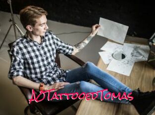 A0TattooedTomas